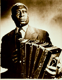 famous musician Huddie Ledbetter playing an accordion